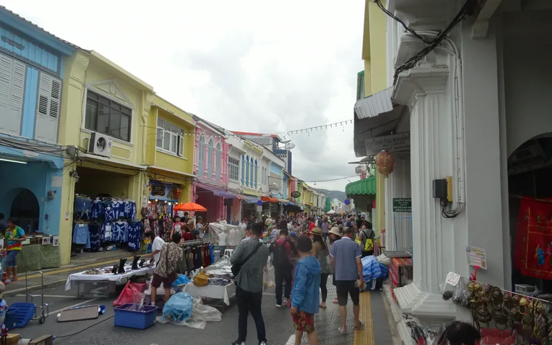 Market stalls and pedestrians on Thalang Road during Phuket Sunday Walking Street