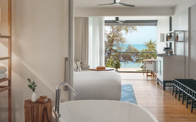 Kimpton Kitalay Samui Essential Sea View room with king bed and sea-facing outlook